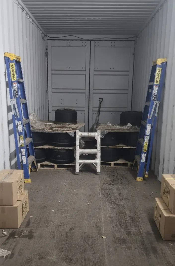 Shipping container converted to tire storage facility